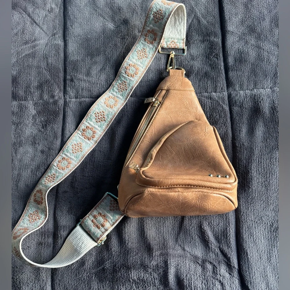Brown Vegan Leather Sling‎ Bag with floral strap.